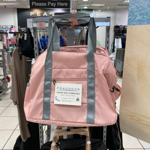 a photo of an airline travel bag from peacocks perfect for summer holidays